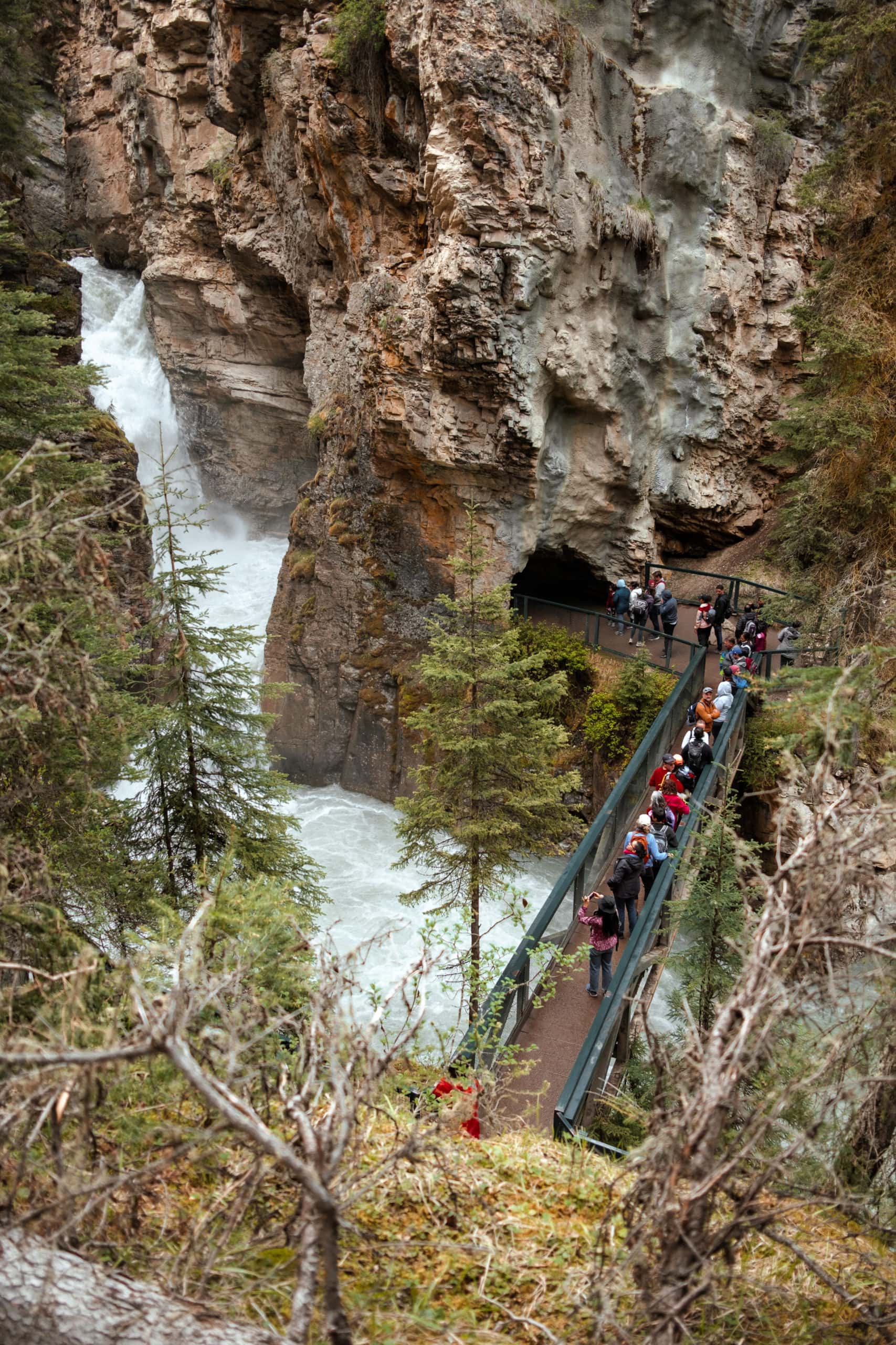 People stand a bridge.