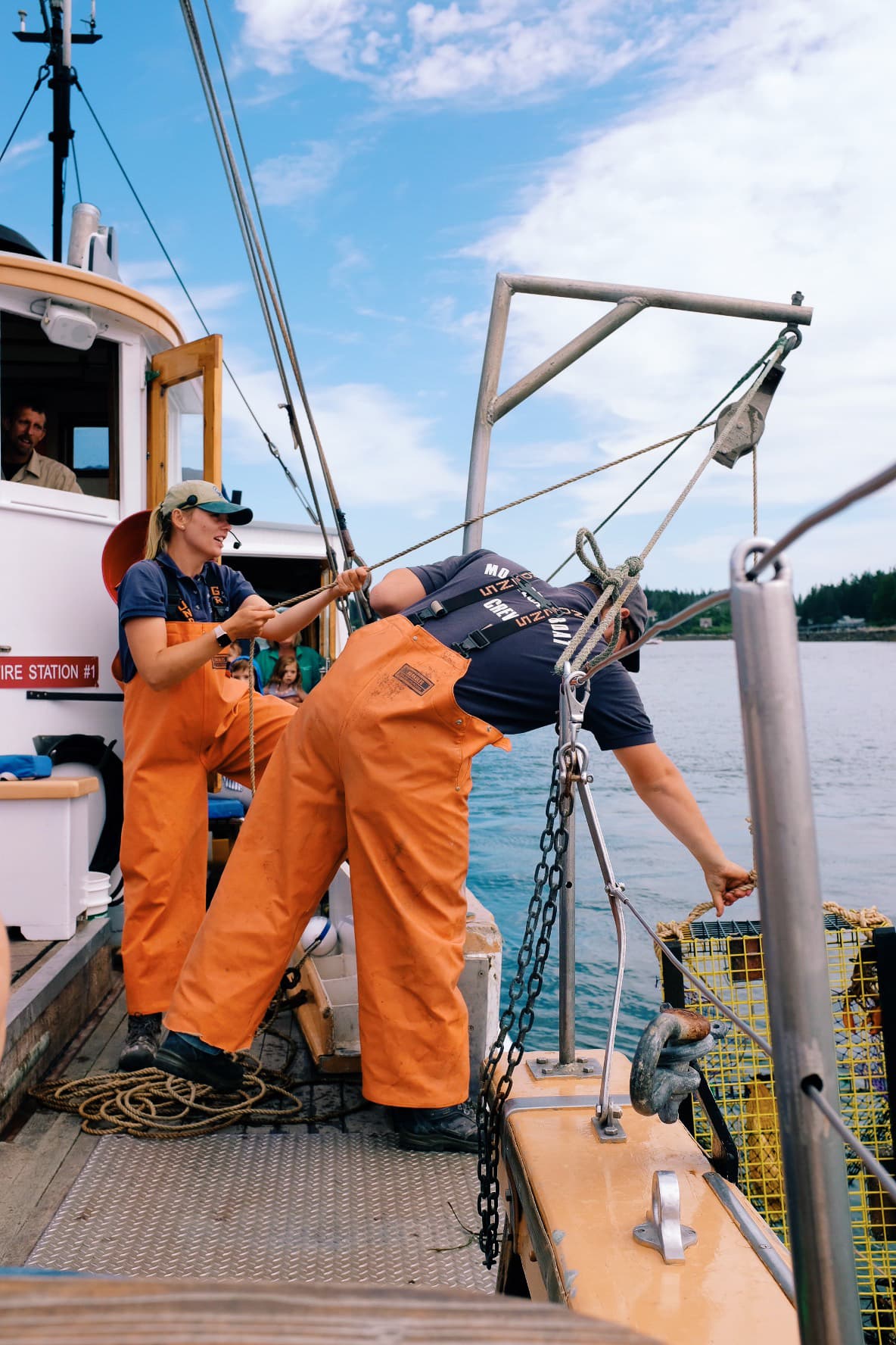 Boat workers pulling up a trap.