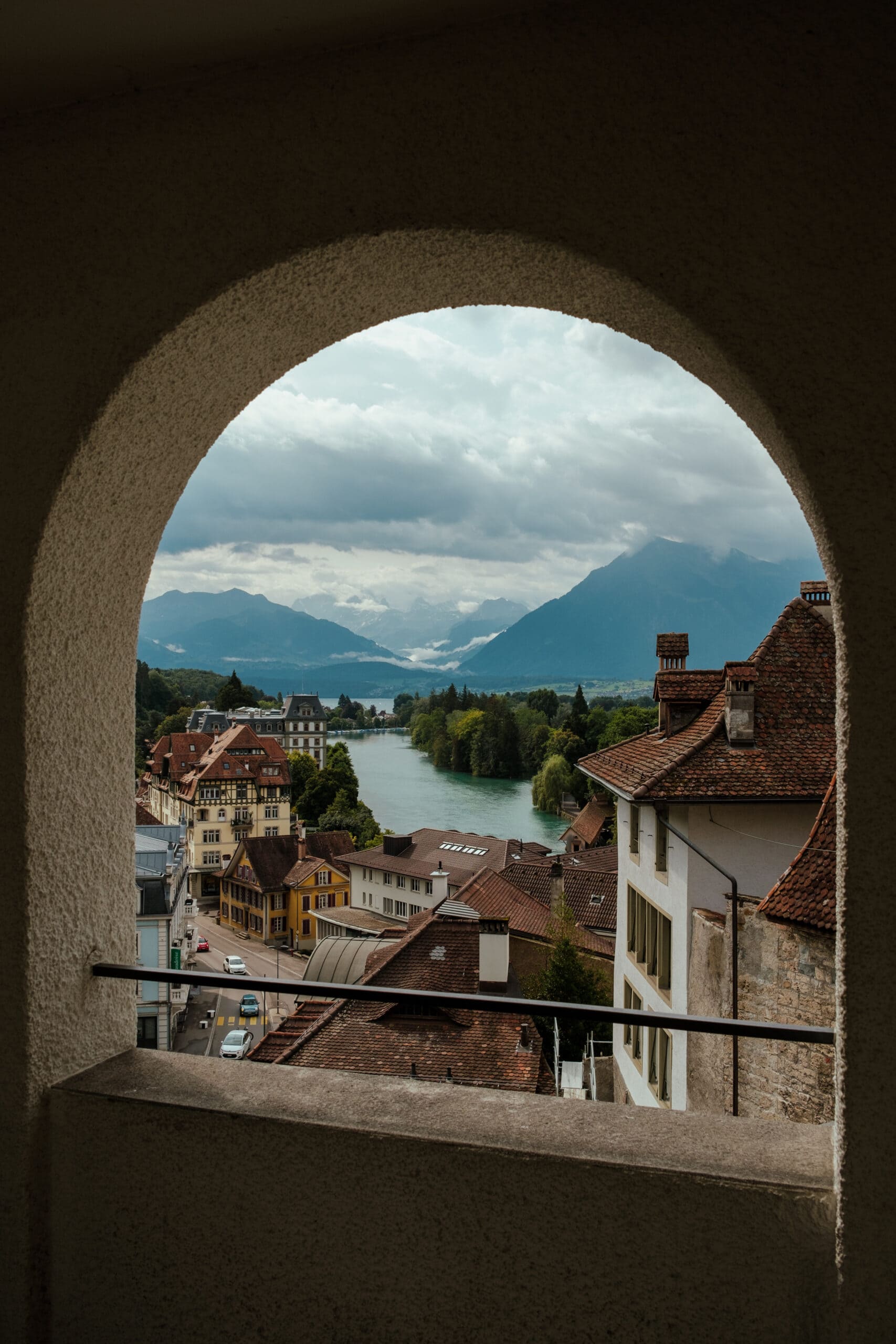 The view of a lake and mountains from a spot in Thun.