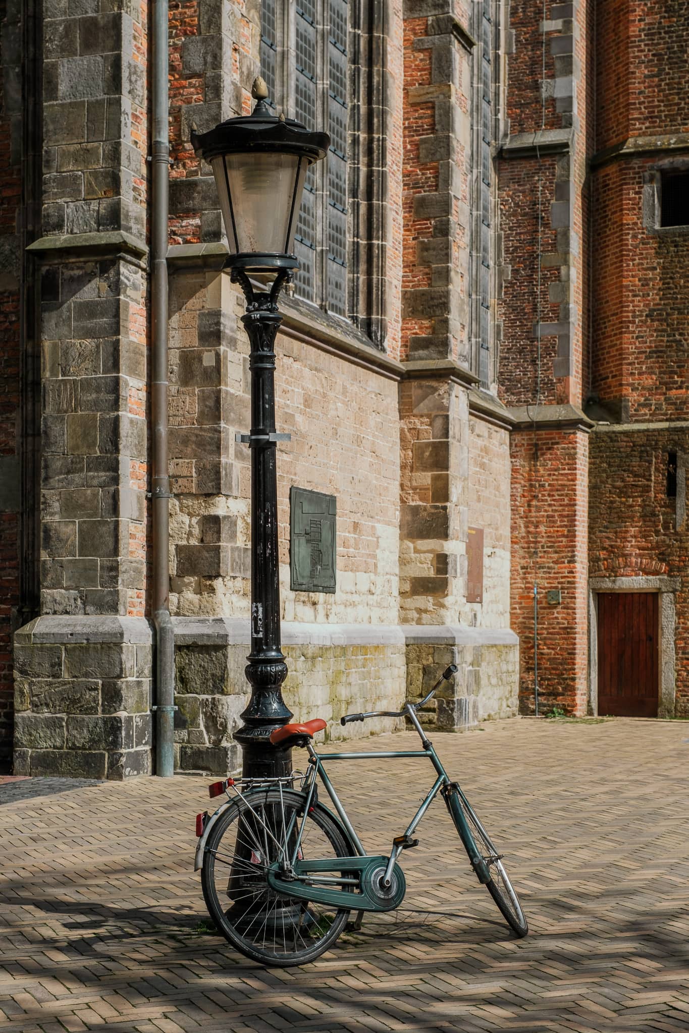 A bike is propped against a lightpost in Utrecht.