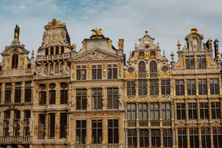 Ornate, guilded buildings in a row.