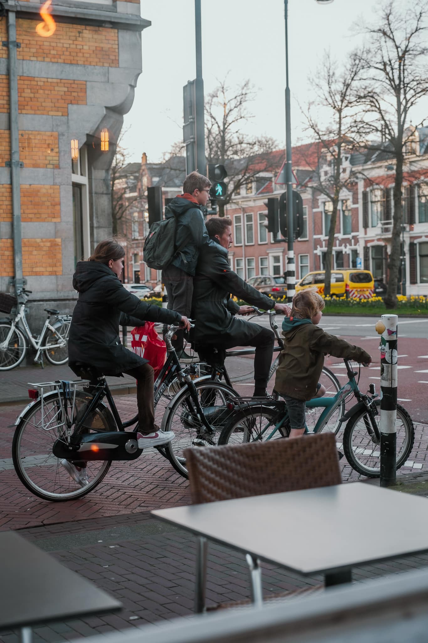A family riding on bikes in Haarlem.