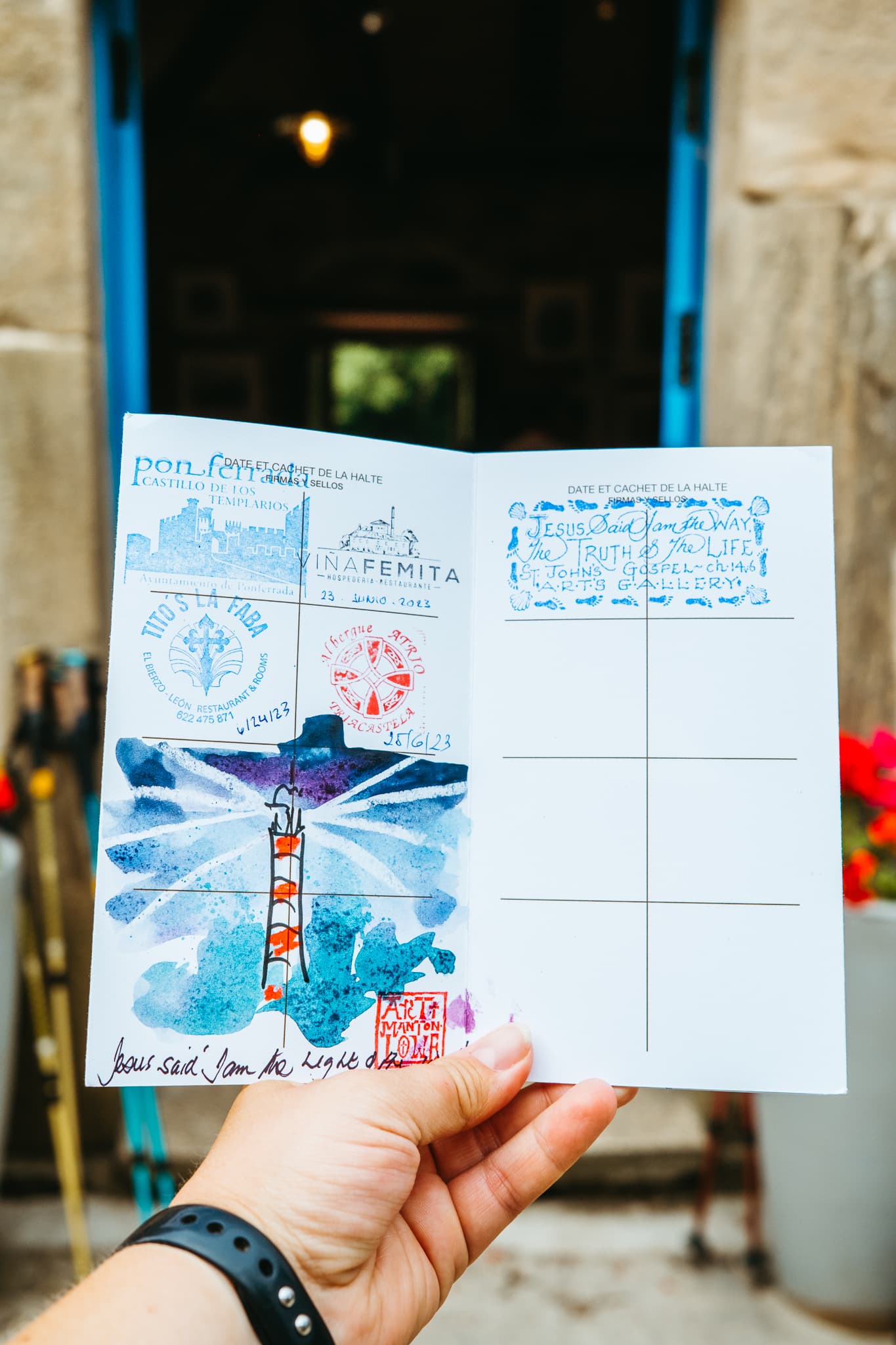 My Camino credencial, including a custom watercolor "stamp" of a lighthouse.