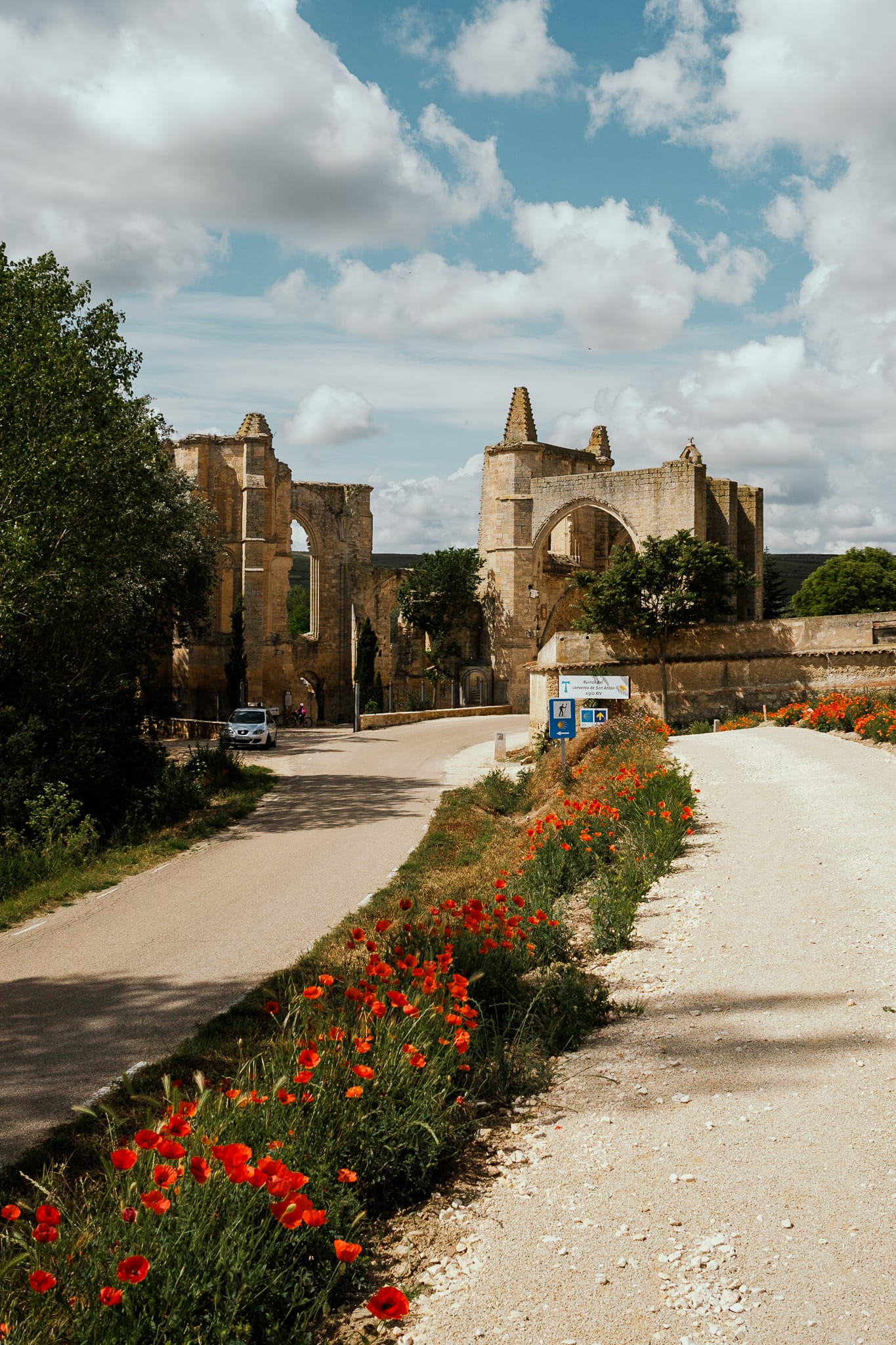 The ruins of the convent of San Anton, straddling the way.