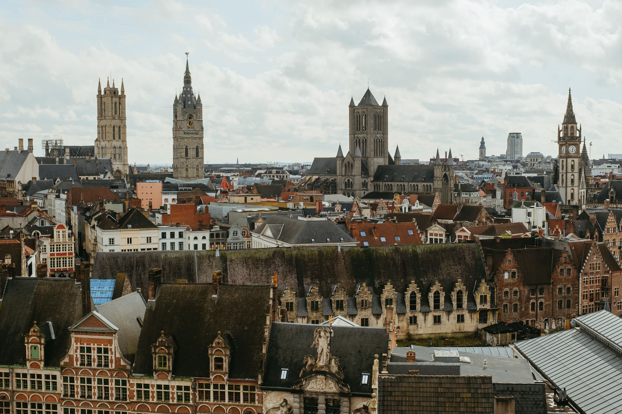 View of Ghent's three towers and many rooftops from Gravensteen.