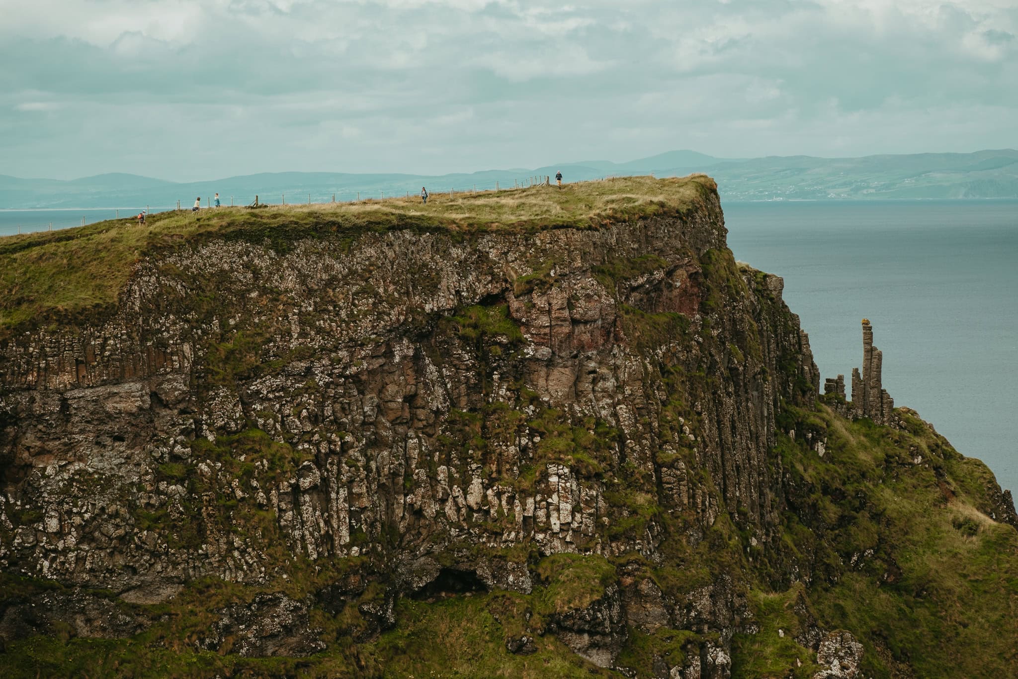 Huge cliffs along the Causeway Coast Way hiking trail.