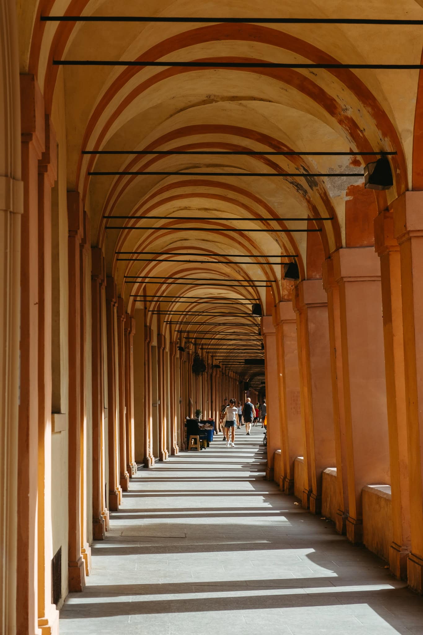 The Portico di San Luca curves around a corner.