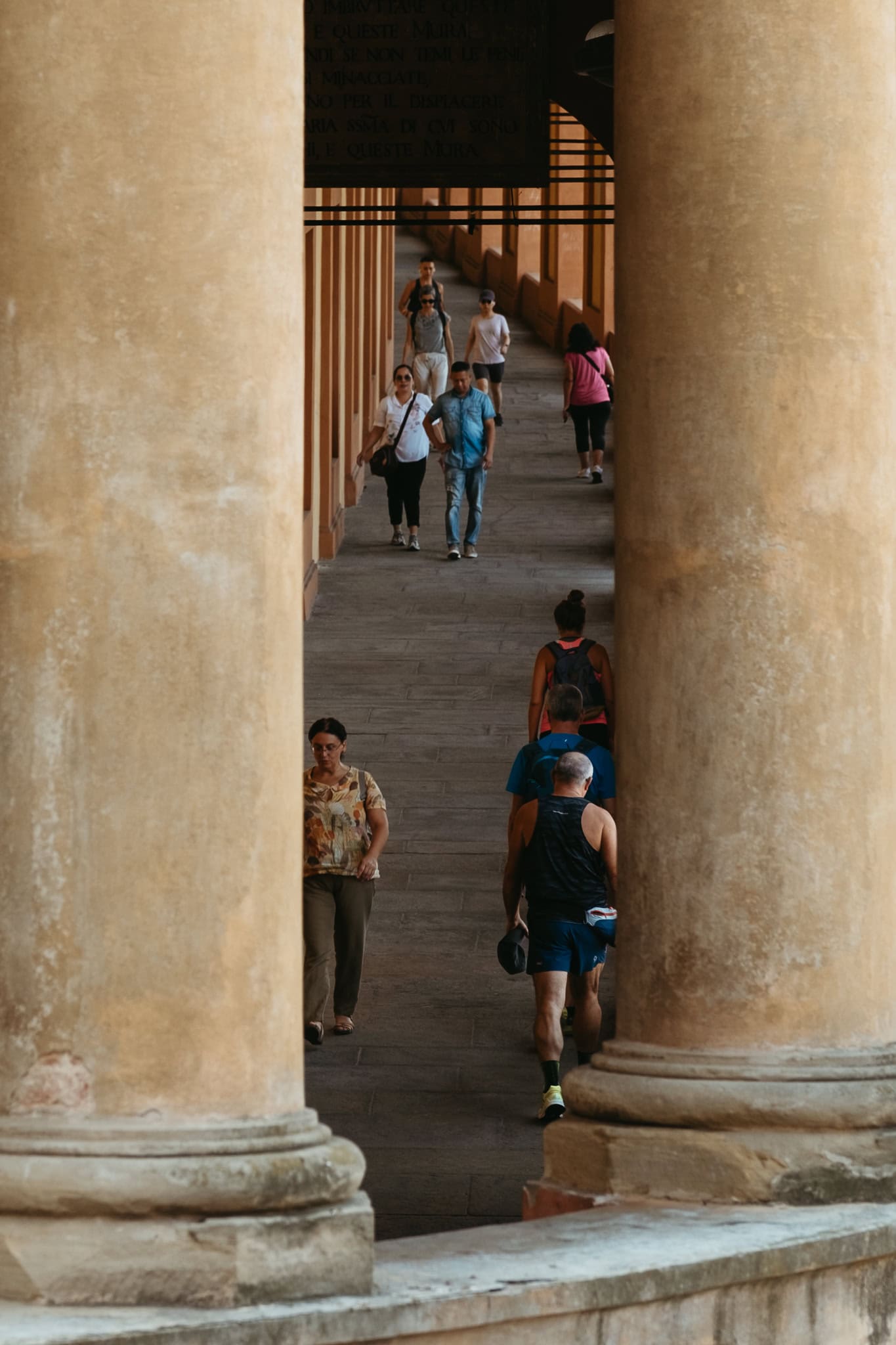 Looking through the pillars of Arco del Meloncello.