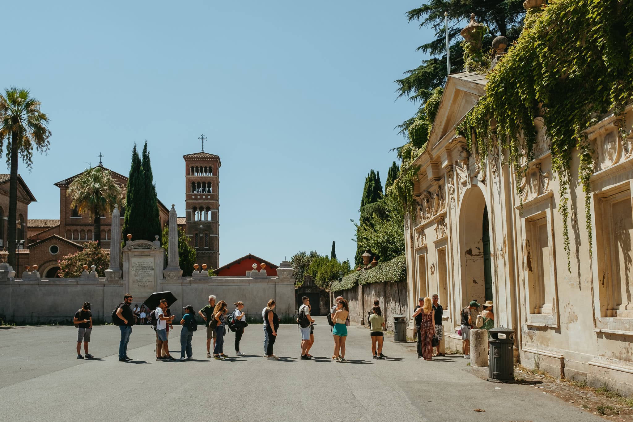 A line of people waiting to look through the Aventine Keyhole.