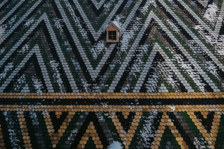 A close-up view of a tile design on a rooftop.