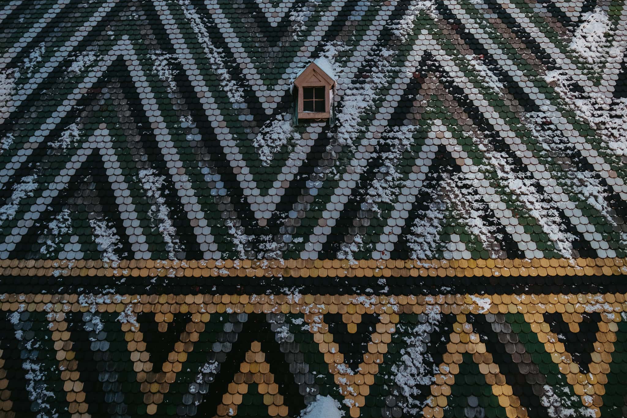 A close-up view of a tile design on a rooftop.