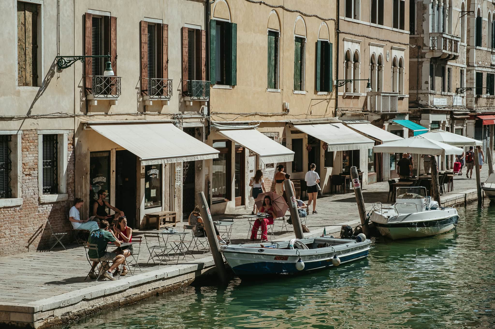 Restaurants and boats along a canal.