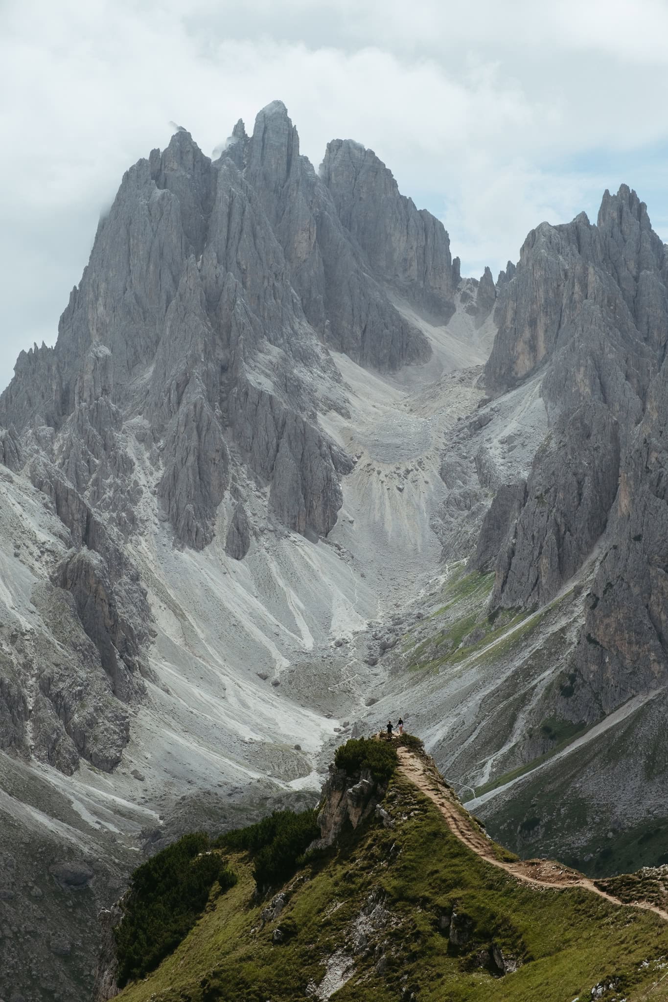 People standing at the Cadini di Misurina viewpoint.