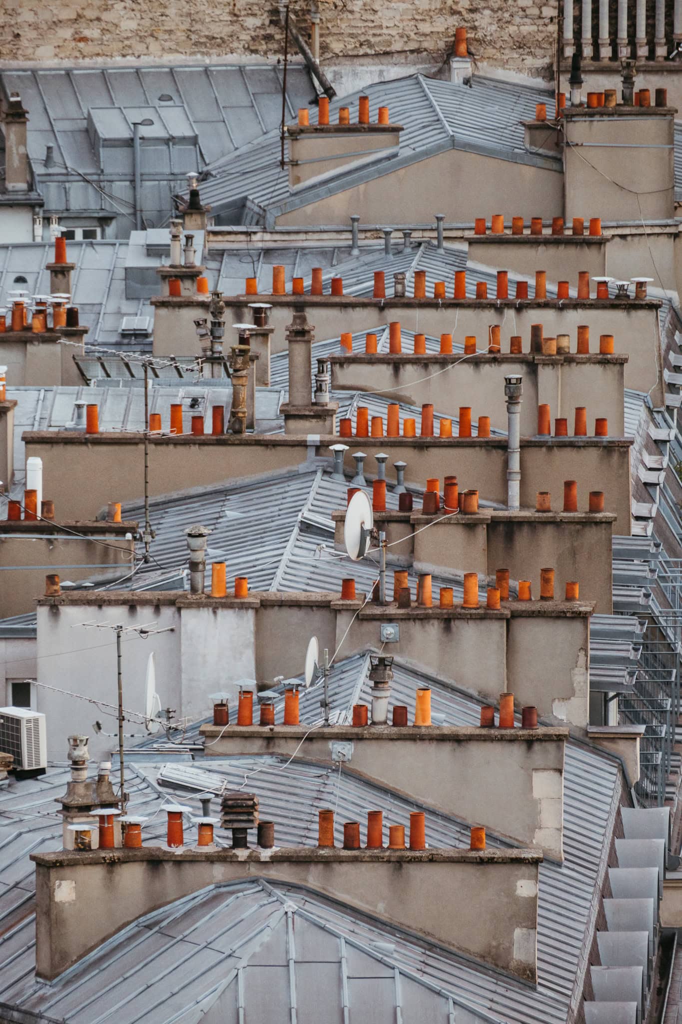 An overhead view of Parisian chimney pots.